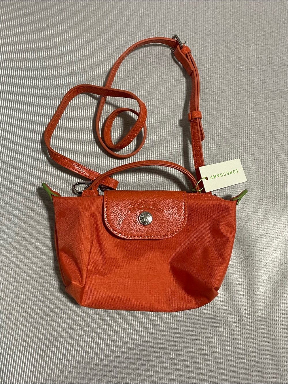 Longchamp Small Crossbody Bag in Bright Orange with Green Accents